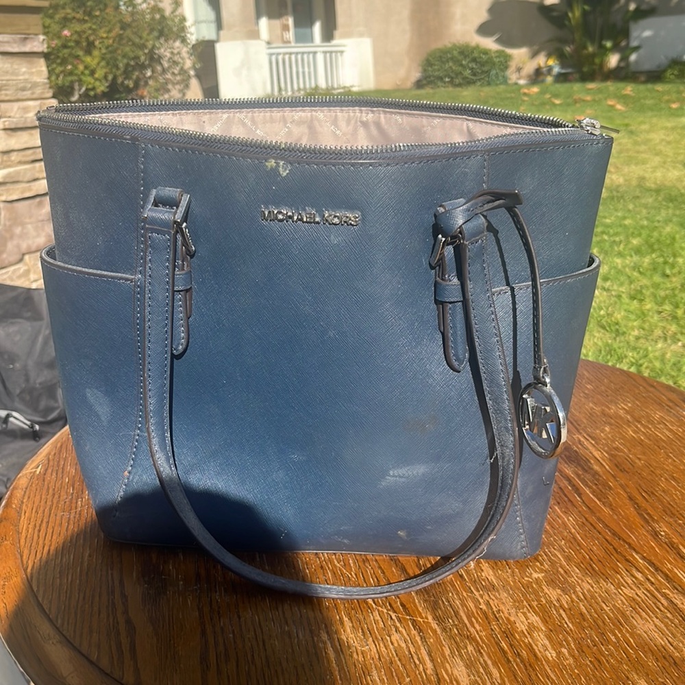 Michael Kors Blue Purse. Good condition. Trying to sell quickly